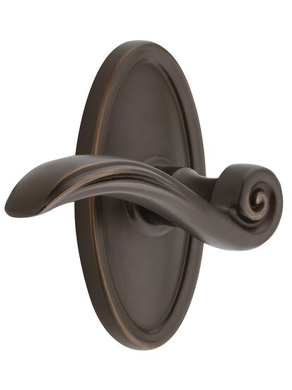 Oval Rosette Set With Elan Levers Left Hand in Oil Rubbed Bronze.